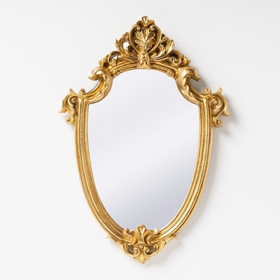 Retro decorative mirror with gold foil resin frame in European vintage style. Elegant wall-mounted mirror with intricate detailing for luxe home decor.